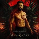 Marco (2024), directed by Haneef Adeni, is a Malayalam neo-noir action thriller that has polarized audiences. While praised for its stylish action and Unni Mukundan’s performance, it has also been criticized for excessive violence and a thin storyline.